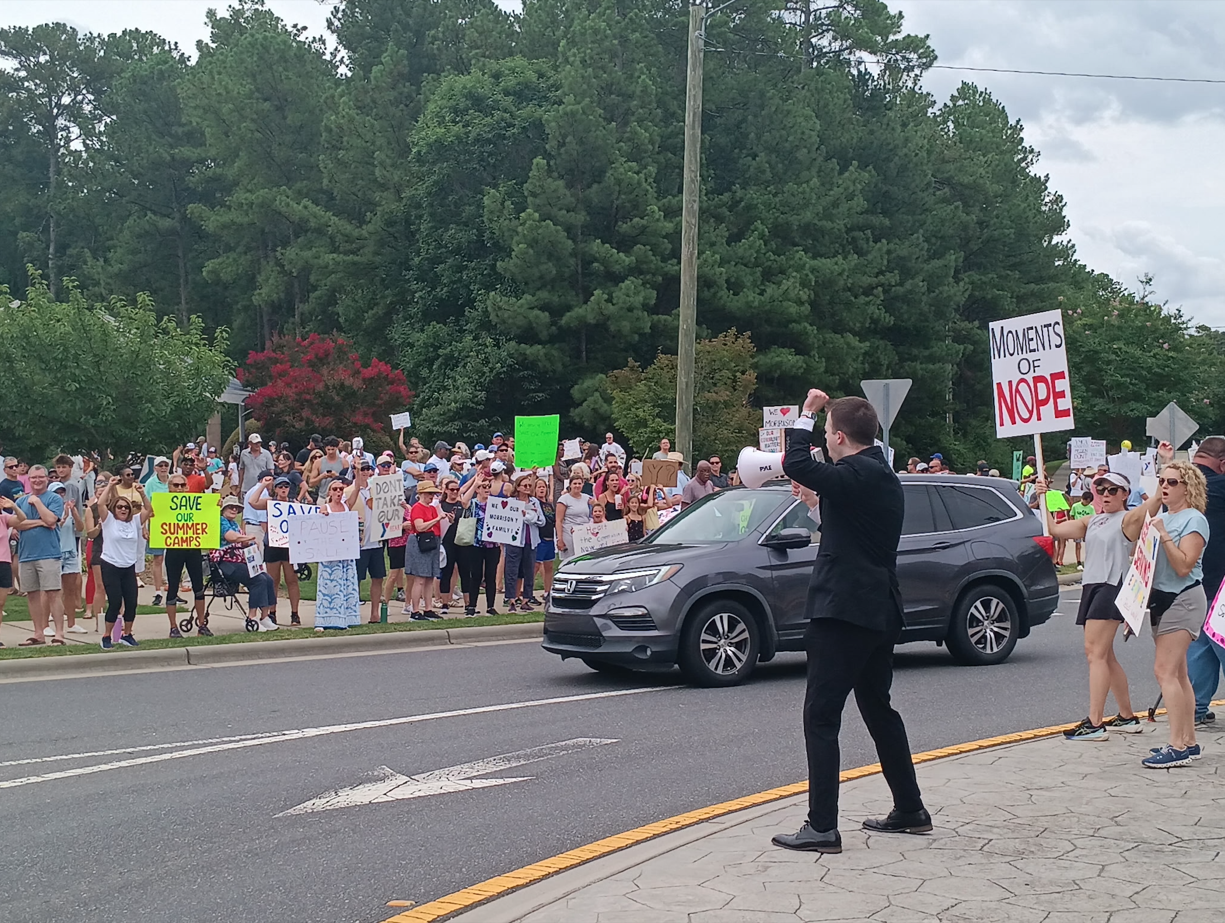 JD Hopper addressing a large Save Morrison YMCA rally crowd in Ballantyne, Charlotte